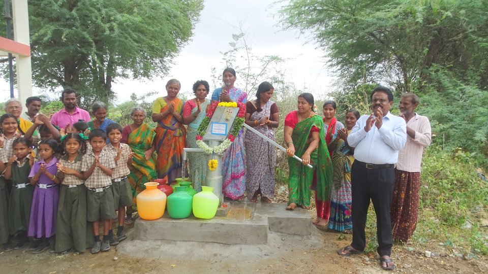 Villagers drawing safe drinking water from refurbished borewell
